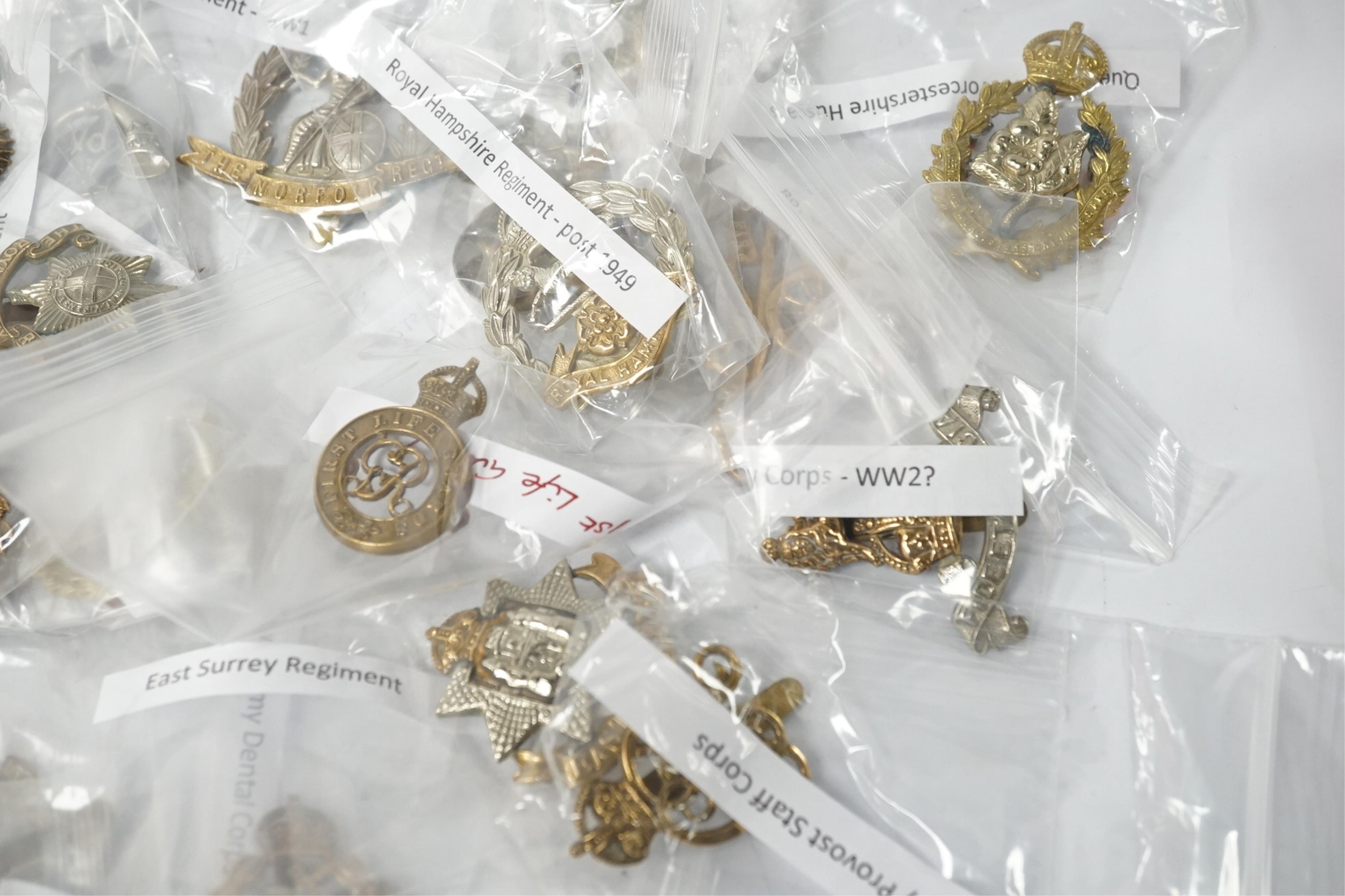 Fifty military cap badges, including; the Duke of Lancaster’s Own regiment, the Blues and Royals, Glider Pilot regiment, Sherwood Foresters regiment, Leicestershire regiment, Royal West Kent regiment, Inns of Court regim